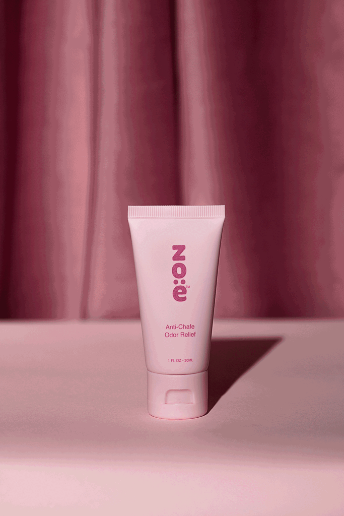 Zoe photoshoot Pink product on a pink table with dark background, photographed by Atlanta product photographer Natalia Tamariz, highlighting vibrant product design for small brands. GIF